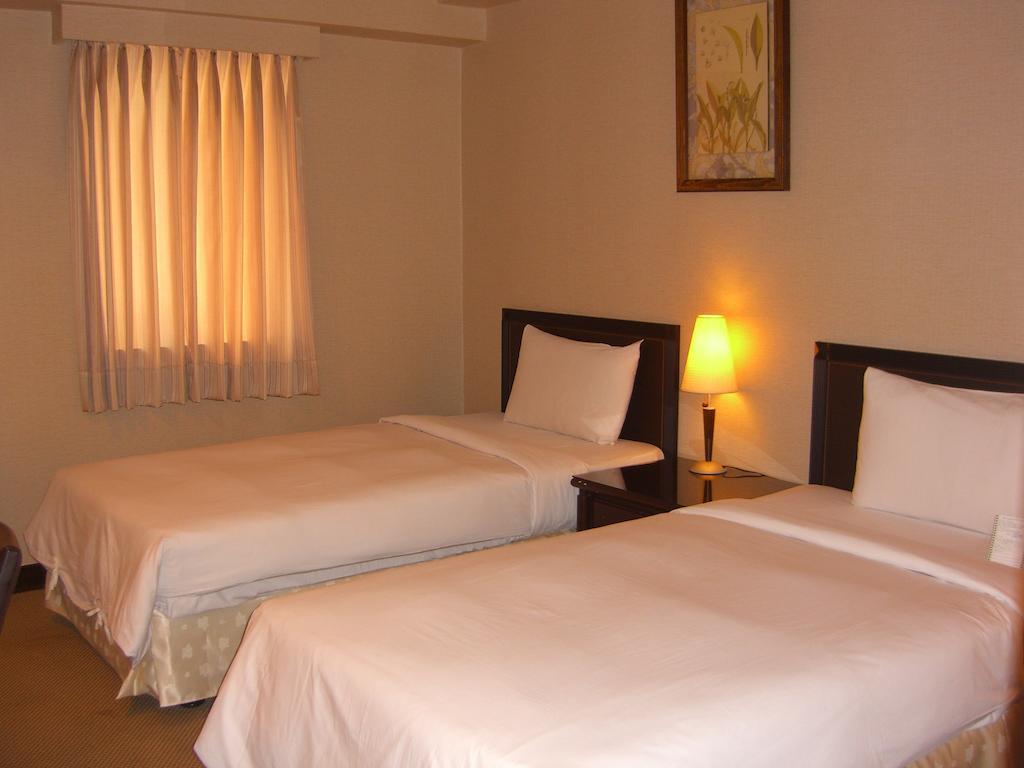 Lincoln Hotel Tainan Oda fotoğraf